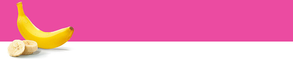 A banana and a sliced banana are presented against a pink background.