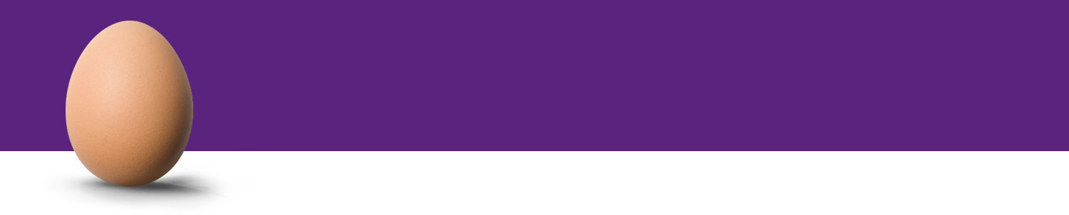 An elongated, oval-shaped object with a smooth surface stands upright against a purple background.
